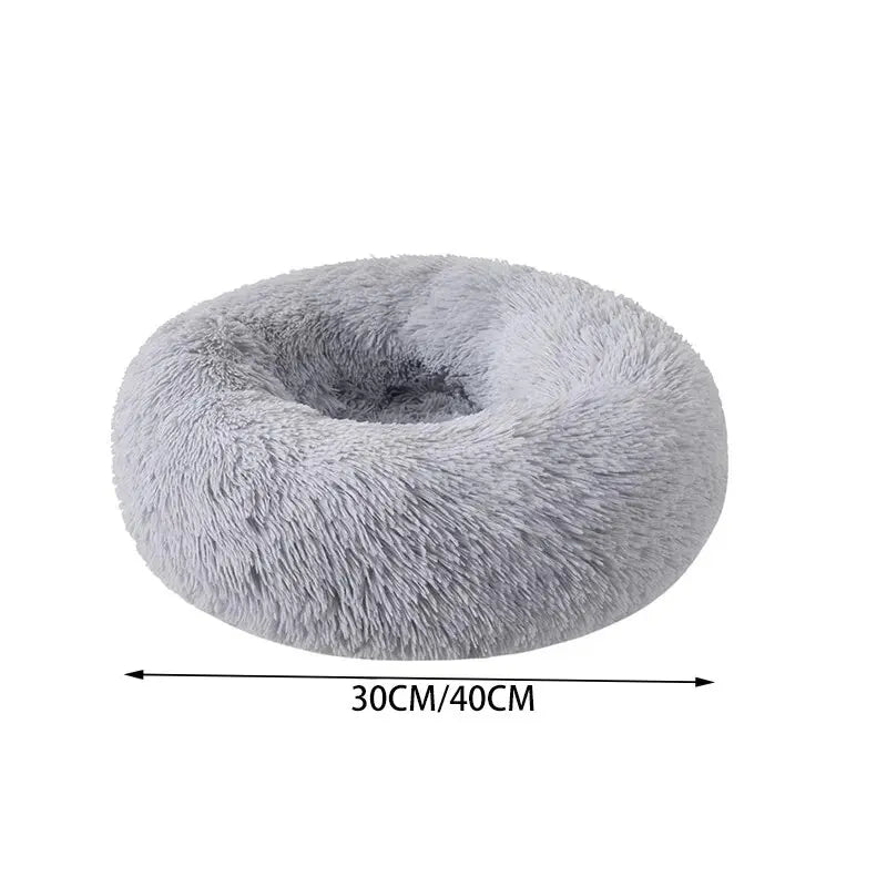 Explore our Cat Nest, a soft shaggy mat ideal for indoor use. This dog and cat bed offers removable, machine-washable features and comes with a cozy pillow for small pets.